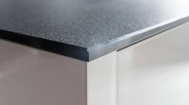Porcelain Slab vs. Granite Stone for Kitchen Benches